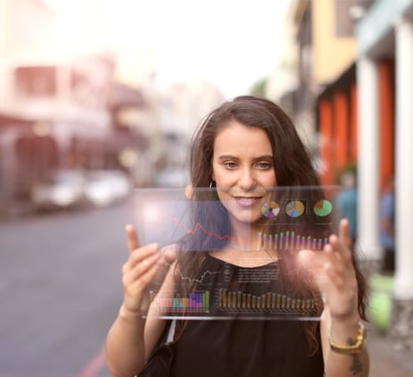 woman looking at tablet